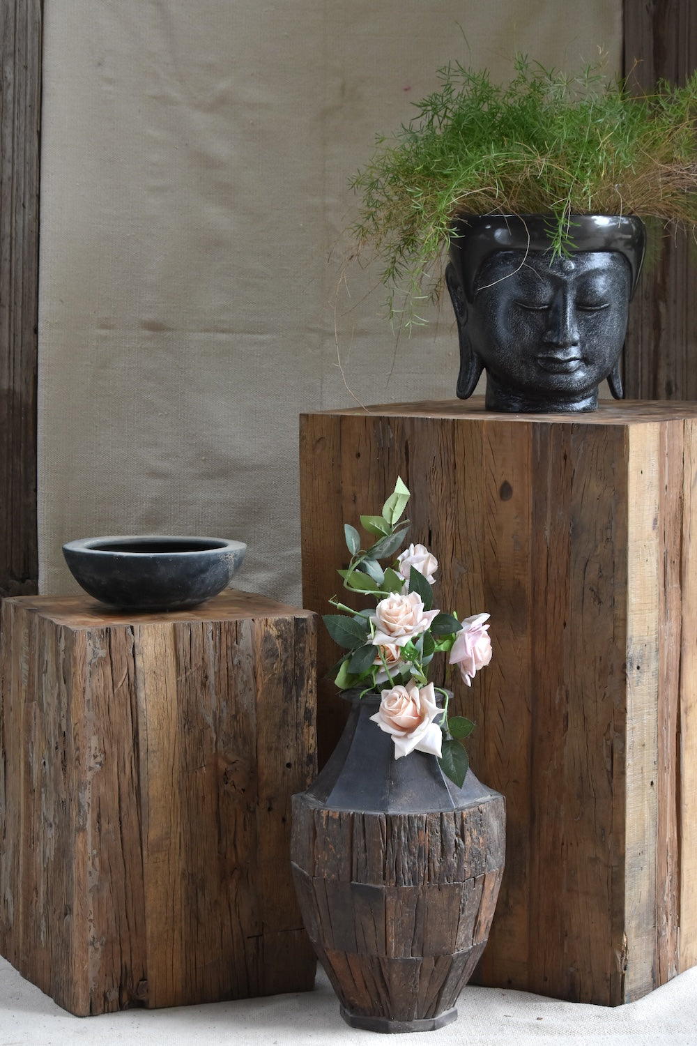Unique handcrafted wooden pedestals designed to add warmth and character to modern spaces. 