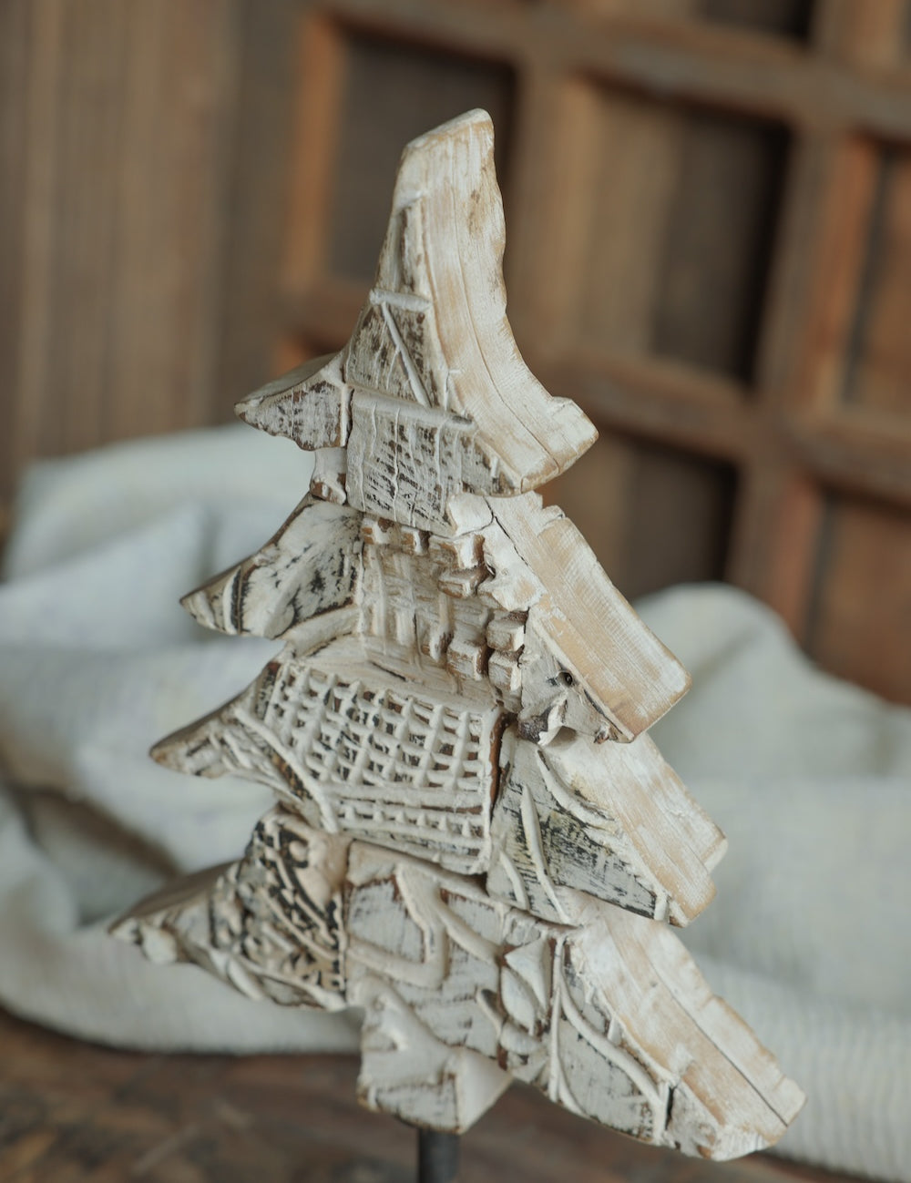 Ekaurr Distressed White Christmas Tree on Iron Base handcrafted paper mache tree in a whitewashed distressed finish mounted on an iron base, rustic festive home decor accent for shelves and mantels