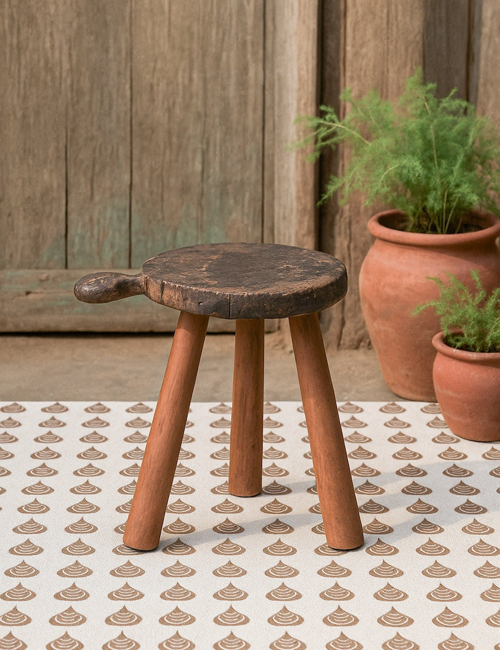Ekaurr 3 Legged Wooden Chaklota Stool with repurposed traditional Indian chapati board seat, handcrafted rustic cultural heritage accent stool
