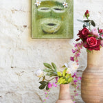 Ekaurr Abstract Face Artwork shown in a styled home setting demonstrating scale and placement