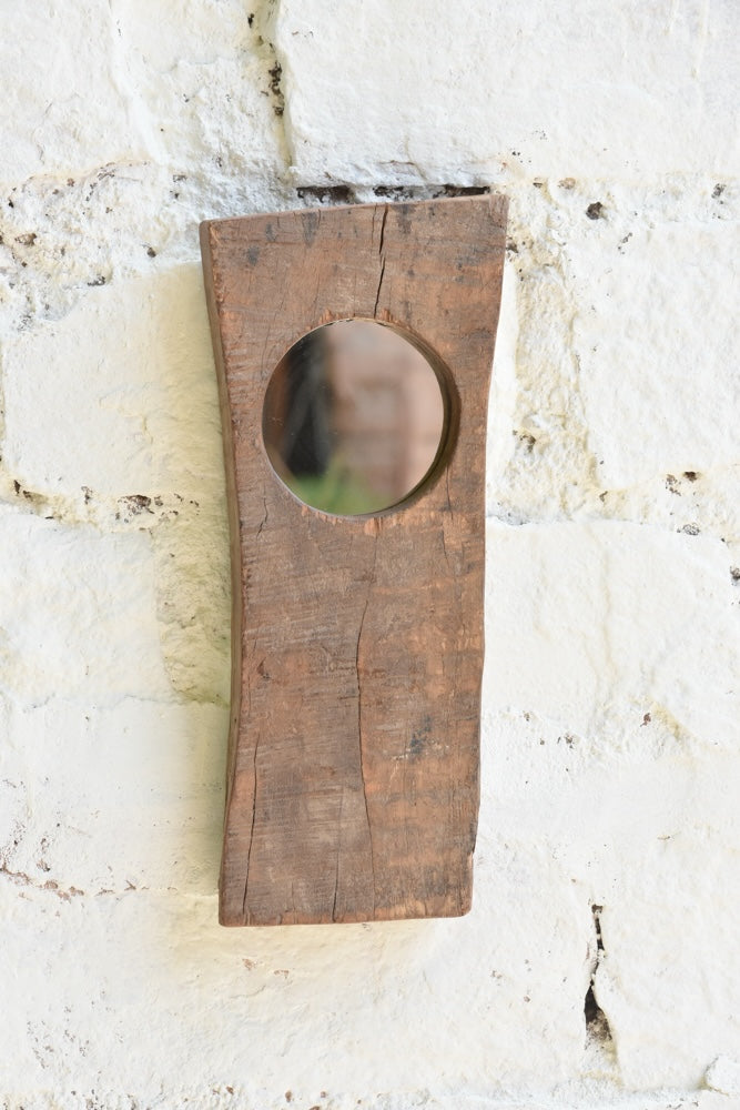 Ekaurr Abstract Wooden Mirror Single one smooth circular mirror inset into a raw-edged reclaimed wood plank with natural grain and aged texture, artisan sculptural wall mirror for entryways shelves and eclectic home styling