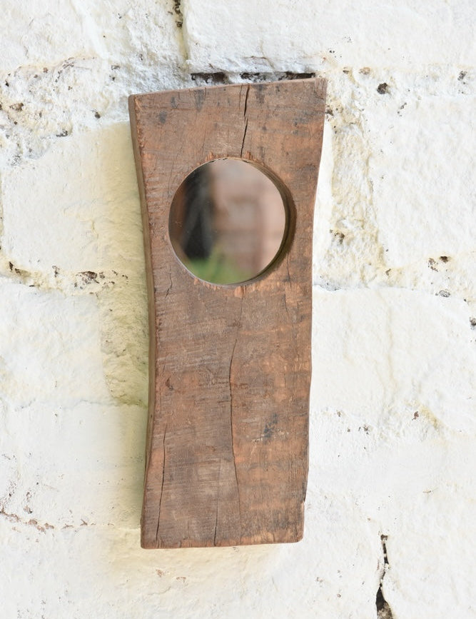 Ekaurr Abstract Wooden Mirror Single one smooth circular mirror inset into a raw-edged reclaimed wood plank with natural grain and aged texture, artisan sculptural wall mirror for entryways shelves and eclectic home styling
