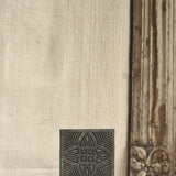 Ekaurr Artistry Print Block on Marble Base Décor, vintage hand-carved Indian textile printing block repurposed as table décor on a marble base, artisan heritage display piece