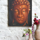 Ekaurr Awakened Serenity large Buddha wall art in earthy brown tones with textured handcrafted finish and serene facial detailing at 24x32 inches, spiritual home decor for meditation corners and tranquil nooks