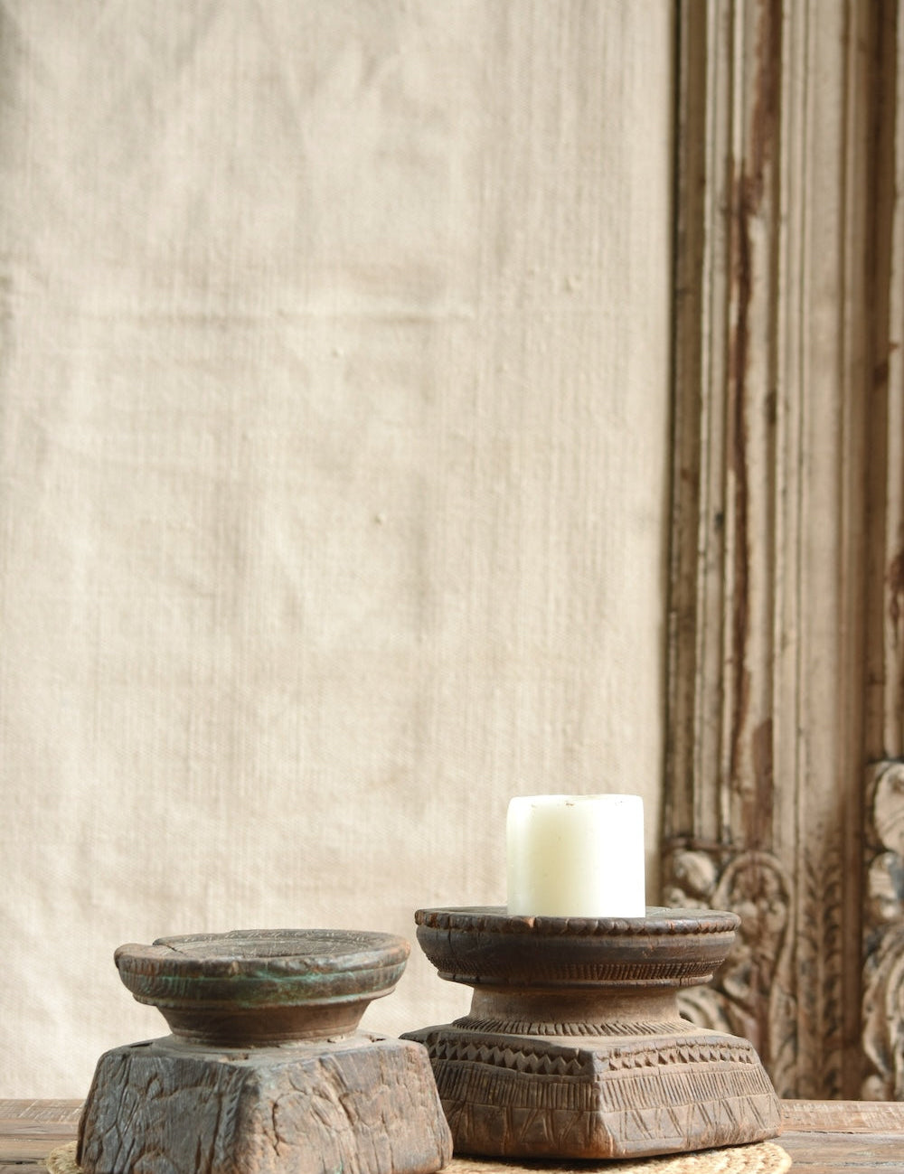 Ekaurr vintage wooden Bijani candle holders set of 2 with iron plates showing intricate hand-carved detailing and aged natural wood finish