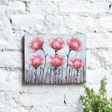 Ekaurr Blush Bloom painting with delicate floral bloom forms in soft blush pink rose and warm white tones, handcrafted botanical canvas art for bedrooms living rooms and romantic home interiors