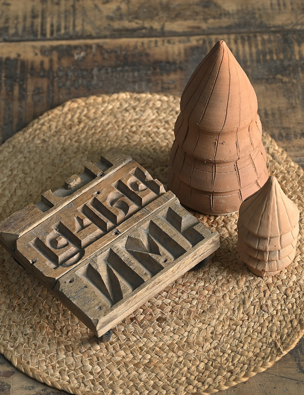 Ekaurr Brick Mold Emblem Riser vintage clay brick mould repurposed as a decorative display riser with emblem detailing, found object artisan pedestal for sculptures candles and home accents