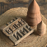 Ekaurr Brick Mold Emblem Riser vintage clay brick mould repurposed as a decorative display riser with emblem detailing, found object artisan pedestal for sculptures candles and home accents