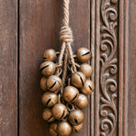 Ekaurr Bunch of 30 Brass Bells Wall Hanging cluster of vintage brass ghungroo bells tied together as a melodic wall hanging, auspicious artisan home decor for entryways altars and festive Indian-inspired home styling