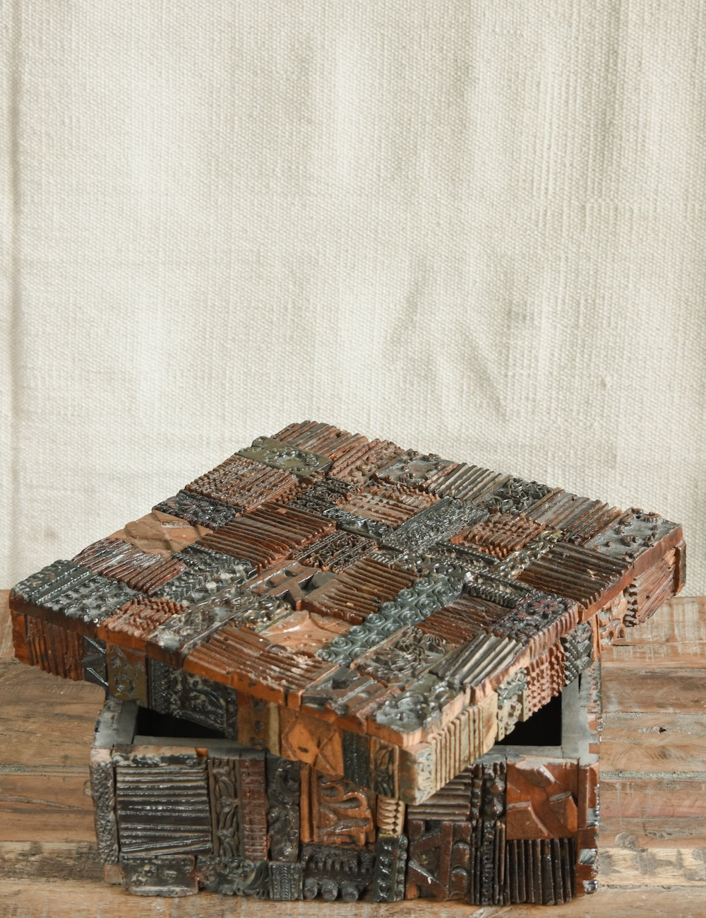 Detail of Ekaurr carved print block box lid showing intricate hand-carved floral and geometric motifs