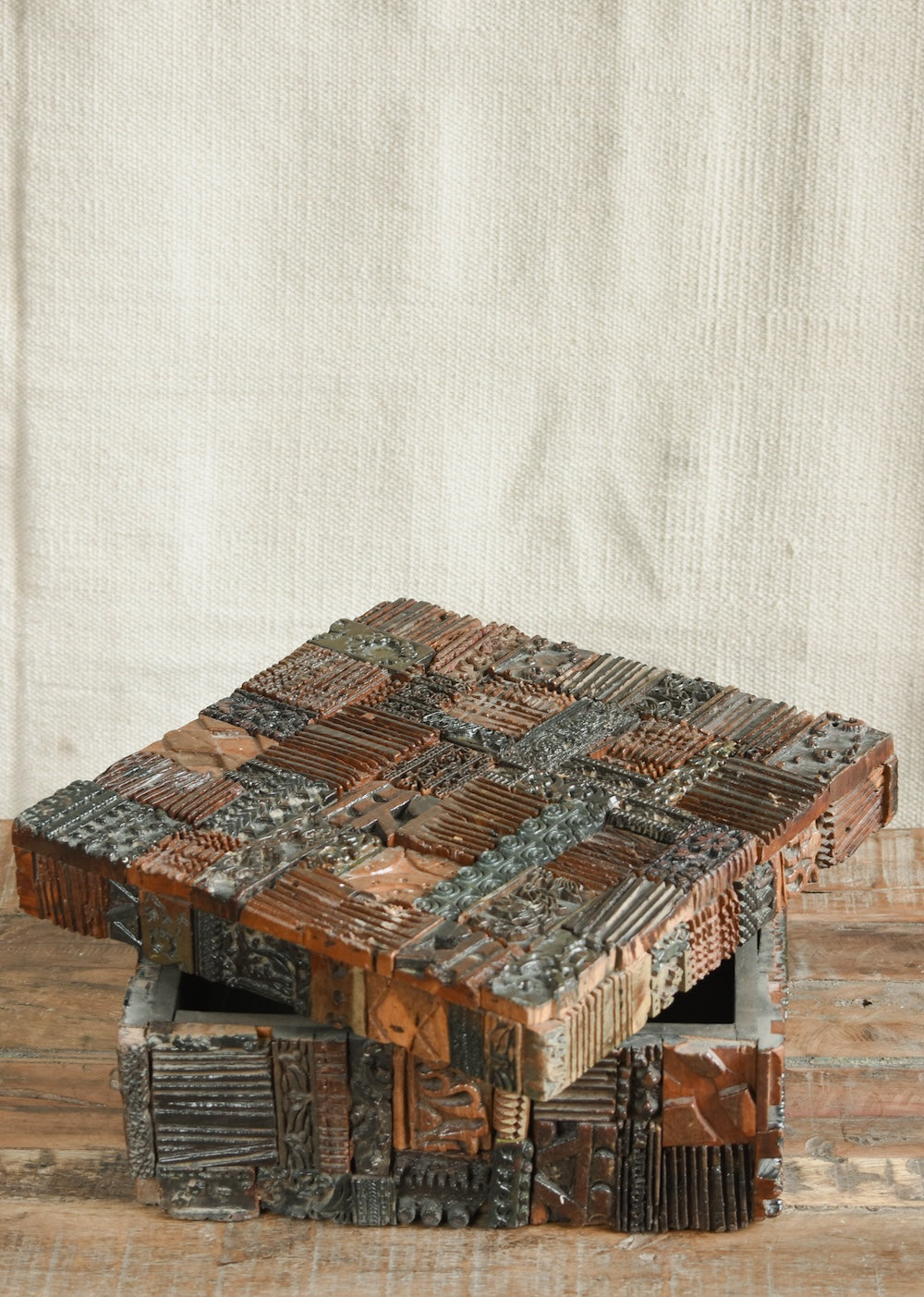 Detail of Ekaurr carved print block box lid showing intricate hand-carved floral and geometric motifs