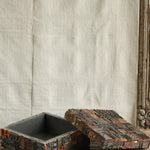 Detail of Ekaurr carved print block box lid showing intricate hand-carved floral and geometric motifs