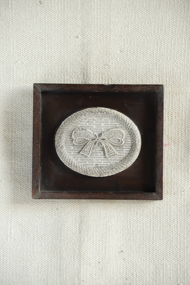 Ekaurr Ceramic Tile Wall Art – The Lace Bow Emblem, handcrafted embossed ceramic tile with classical bow motif in deep wooden shadow box, vintage home wall accent