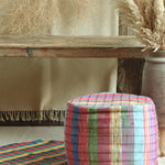 Ekaurr Chindi Pouffe and Rug Set handwoven from upcycled fabric scraps with bold colourful stripes, sustainable artisan home decor set
