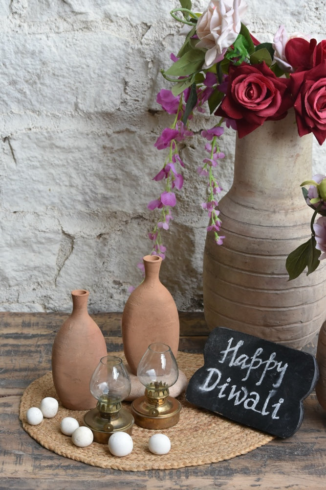 Ekaurr Clay Flame Gift Set curated artisan gift set of handmade terracotta or clay tea light holders by rural Indian artisans with complimentary greeting card, earthy sustainable gifting celebrating Indian clay craft for home ambience and conscious gifting