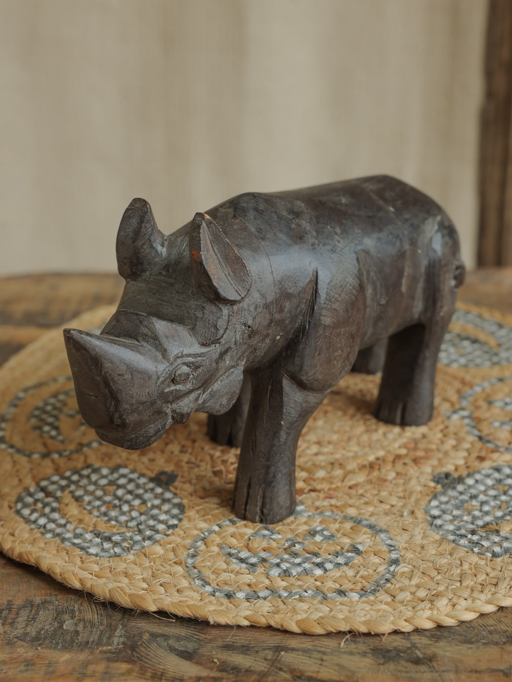 Ekaurr Dark Brown Wooden Rhino handcrafted reclaimed wood rhino figurine with dark brown natural finish, rustic artisan wildlife home decor for shelves and nature-inspired styling
