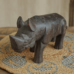 Ekaurr Dark Brown Wooden Rhino handcrafted reclaimed wood rhino figurine with dark brown natural finish, rustic artisan wildlife home decor for shelves and nature-inspired styling