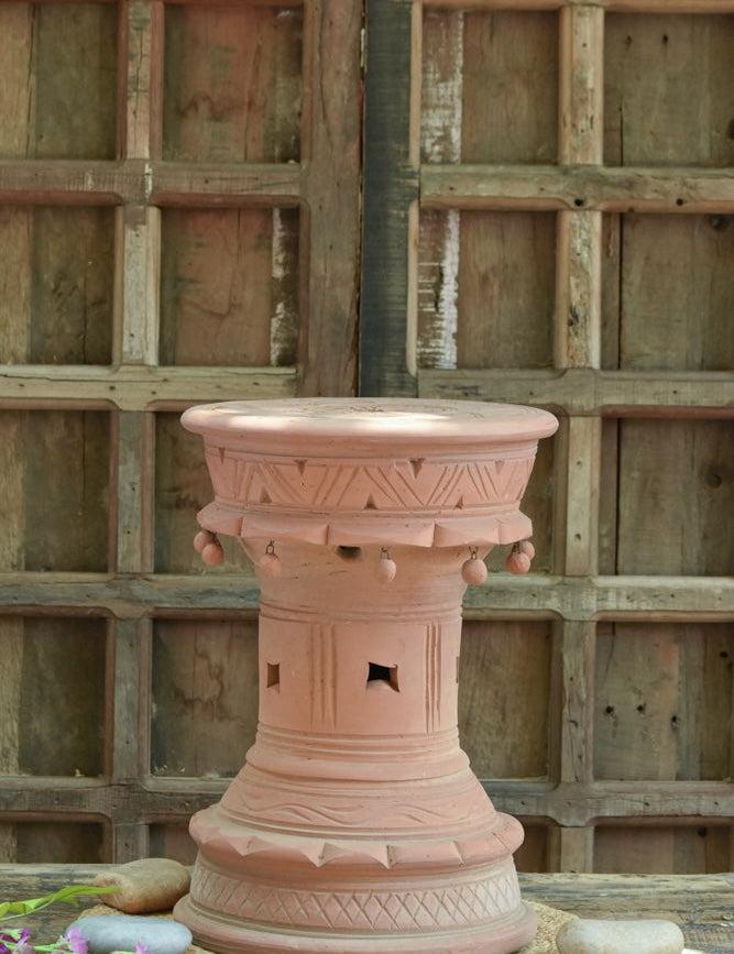 Ekaurr Deep Stambh handcrafted terracotta stool with folk-inspired carvings small danglers and vented pattern detailing, rustic clay pedestal stand for planters sculptures and home decor display