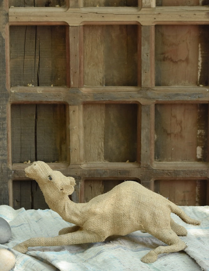 Ekaurr Desert Rest handcrafted jute camel sculpture in a resting pose, earthy natural fibre animal figurine for home decor shelves or nature-inspired styling