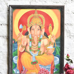 Ekaurr Divine Radiance Ganesha Wall Frame framed artwork of Lord Ganesha in a radiant devotional composition with golden detailing, spiritual wall decor for home altars pooja rooms and auspicious home spaces