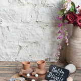 Ekaurr Embers and Earth Gift Set curated artisan gift set of terracotta or clay candle holders and earthy natural material accent pieces with complimentary greeting card, grounding sustainable gifting for conscious homes and meaningful occasions