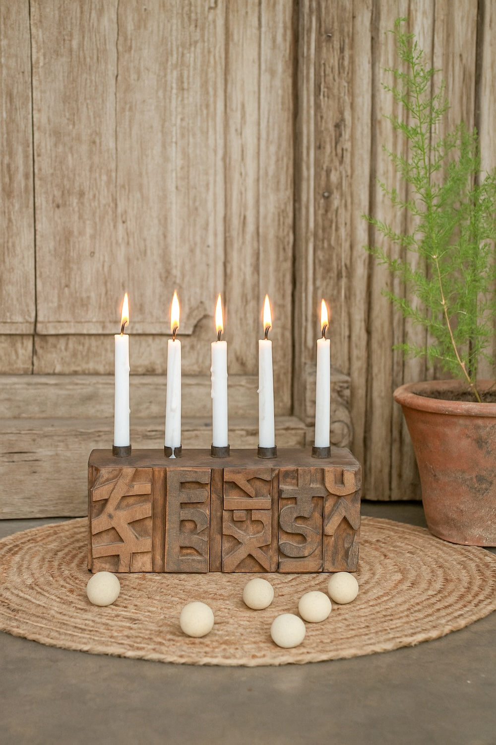 Ekaurr Emblem Candle Holder with 5 candle wells crafted from a repurposed vintage brick mould emblem with hand-carved pattern surface, statement artisan candle holder for mantel dining and rustic home styling