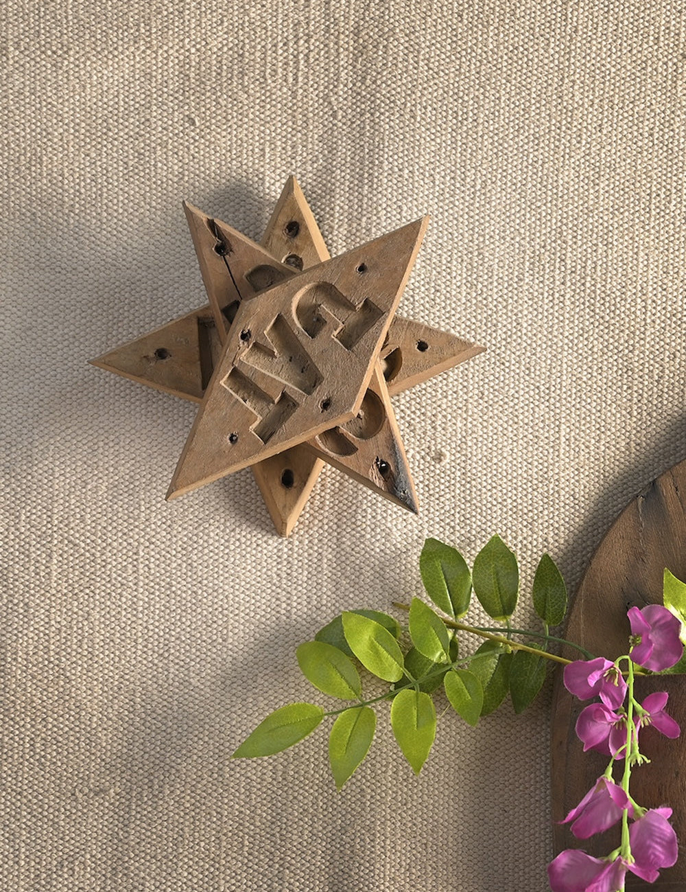 Ekaurr Emblem Star Wall Art vintage brick mould emblem repurposed as a decorative star-motif wall art piece, artisan found object wall accent for rustic and eclectic home interiors
