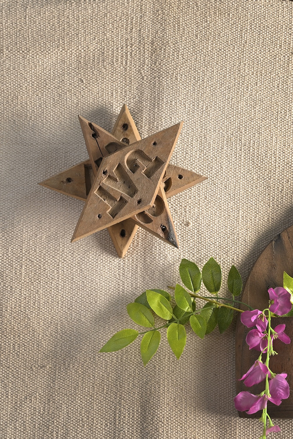 Ekaurr Emblem Star Wall Art vintage brick mould emblem repurposed as a decorative star-motif wall art piece, artisan found object wall accent for rustic and eclectic home interiors