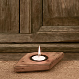 Ekaurr Emblem Tea Light Holder repurposed vintage brick mould emblem with hand-carved relief surface and single tea light well, artisan found object candle holder for shelves and home decor