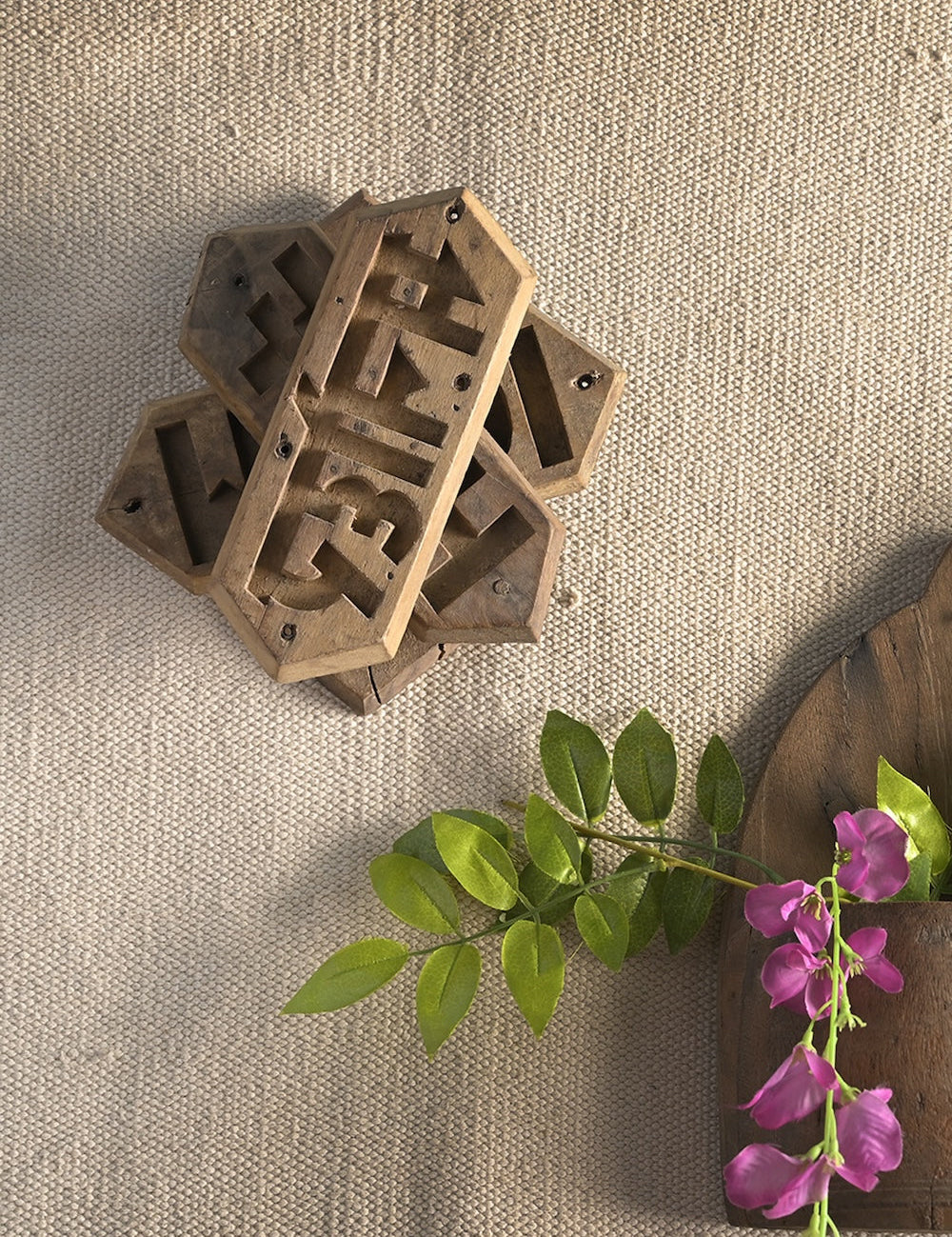 Ekaurr Emblem Wall Art vintage brick mould emblem repurposed as a decorative wall art panel with aged hand-carved relief surface, artisan found object wall accent for rustic and eclectic home interiors