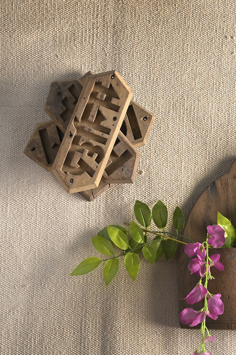 Ekaurr Emblem Wall Art vintage brick mould emblem repurposed as a decorative wall art panel with aged hand-carved relief surface, artisan found object wall accent for rustic and eclectic home interiors