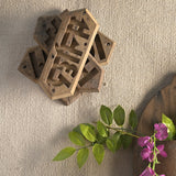 Ekaurr Emblem Wall Art vintage brick mould emblem repurposed as a decorative wall art panel with aged hand-carved relief surface, artisan found object wall accent for rustic and eclectic home interiors