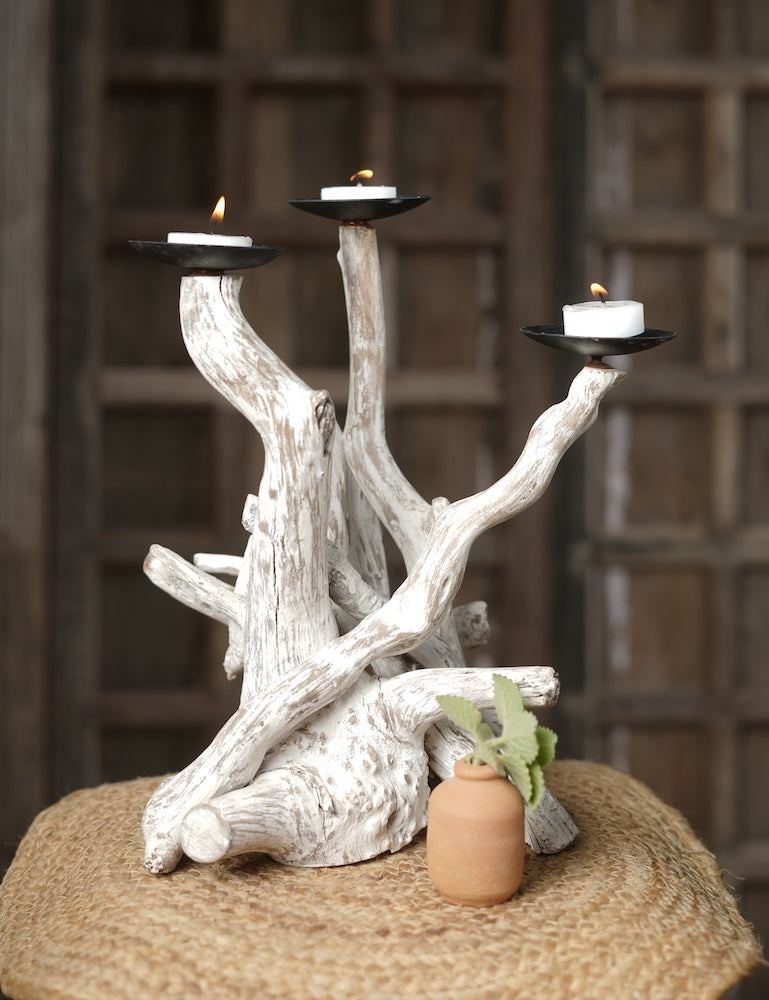Ekaurr Eternal Tide Candle Tree – sculptural driftwood centerpiece holding multiple candles, warm ambient light