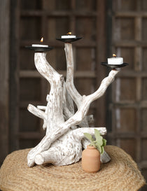 Ekaurr Eternal Tide Candle Tree – sculptural driftwood centerpiece holding multiple candles, warm ambient light