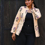 Ekaurr BIGDI Floral Whisper Jacket handcrafted cotton jacket with a softly whispered delicate floral print in muted pastel tones, artisan slow fashion outerwear for women from the BIGDI collection