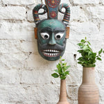 Ekaurr Forest Guardian vintage hand-carved wooden wall mask with bold horns, expressive eyes and intricate crown, one-of-a-kind protective tribal home décor