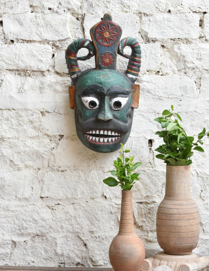 Ekaurr Forest Guardian vintage hand-carved wooden wall mask with bold horns, expressive eyes and intricate crown, one-of-a-kind protective tribal home décor