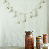 Ekaurr Golden Chime Brass Bells Decor 72-inch bunting of vintage handcrafted brass bells with golden patina and gentle chime, auspicious wall hanging for entryways altars and festive home decor
