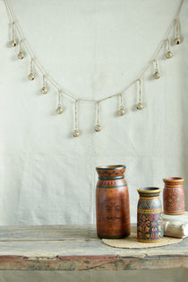 Ekaurr Golden Chime Brass Bells Decor 72-inch bunting of vintage handcrafted brass bells with golden patina and gentle chime, auspicious wall hanging for entryways altars and festive home decor