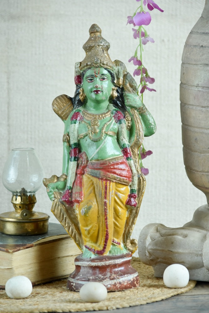 Ekaurr Green Guardian Lord Rama hand-painted folk art idol in green tones with yellow attire holding bow and arrows, regional style devotional figurine for pooja spaces and home decor
