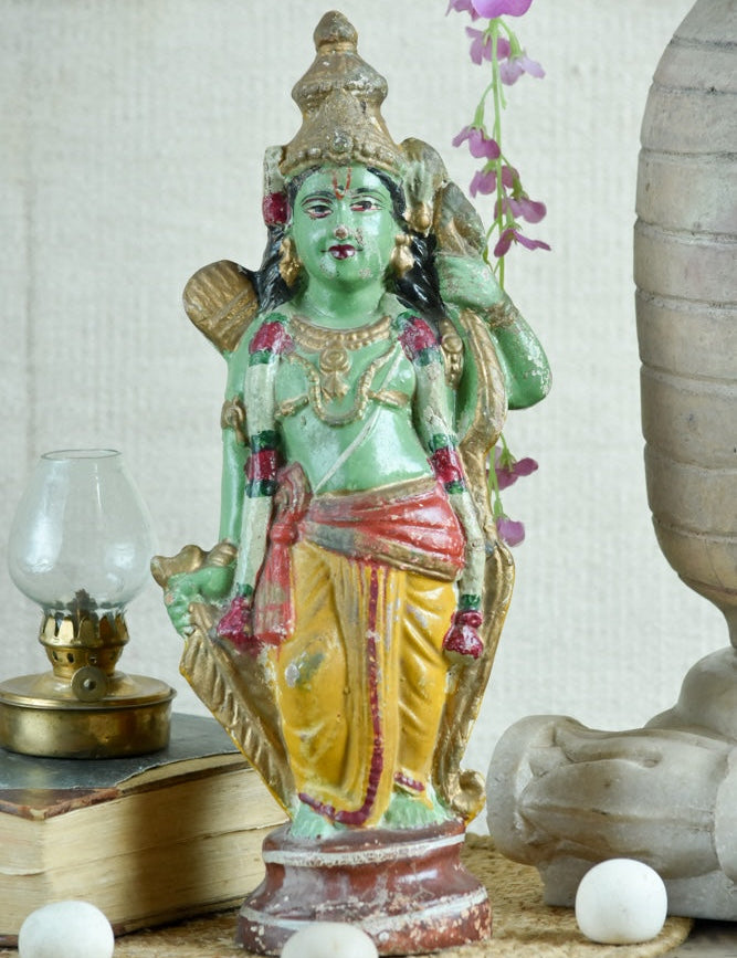 Ekaurr Green Guardian Lord Rama hand-painted folk art idol in green tones with yellow attire holding bow and arrows, regional style devotional figurine for pooja spaces and home decor