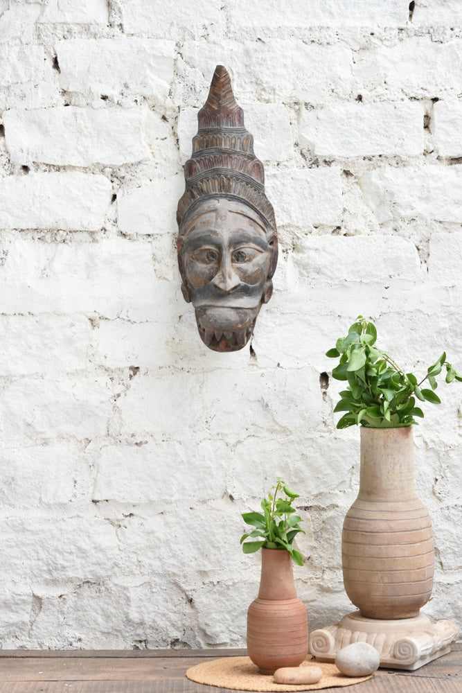 Ekaurr Guardian Spirit hand-carved wooden wall mask with bold commanding features and headdress detailing, vintage one-of-a-kind tribal protective sculpture