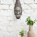 Ekaurr Guardian Spirit hand-carved wooden wall mask with bold commanding features and headdress detailing, vintage one-of-a-kind tribal protective sculpture