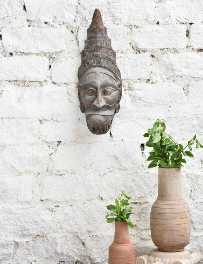 Ekaurr Guardian Spirit hand-carved wooden wall mask with bold commanding features and headdress detailing, vintage one-of-a-kind tribal protective sculpture