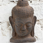 Ekaurr Hand Carved Buddha Wall Sculpture close-up showing soft carved contours, meditative smile and natural aged wood finish