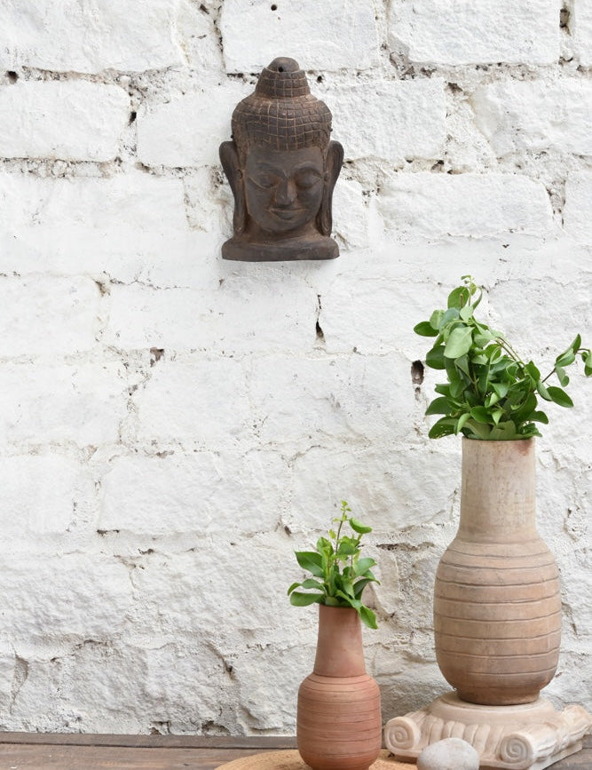 Ekaurr Hand Carved Buddha Wall Sculpture, serene handcrafted wooden Buddha head with closed eyes and meditative expression, vintage one-of-a-kind spiritual wall décor