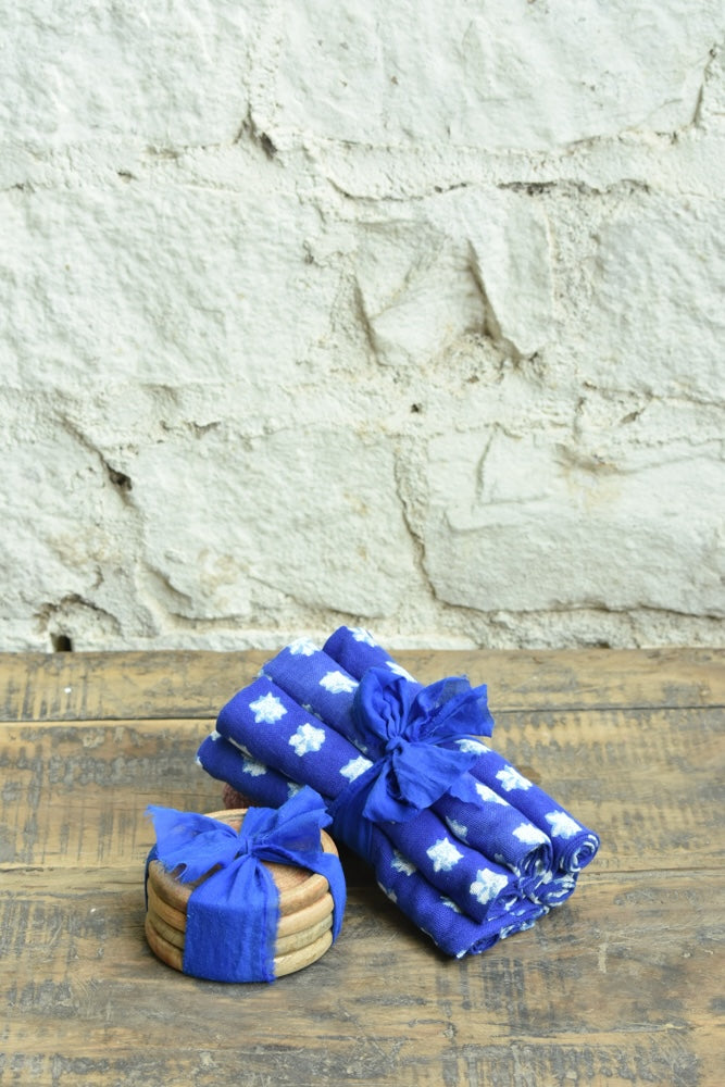 Ekaurr Indigo Charm Table Set curated artisan gifting set of hand-beaded or natural stone coasters paired with indigo block-printed fabric napkins, elegant sustainable table accessory gift for home dining and conscious living