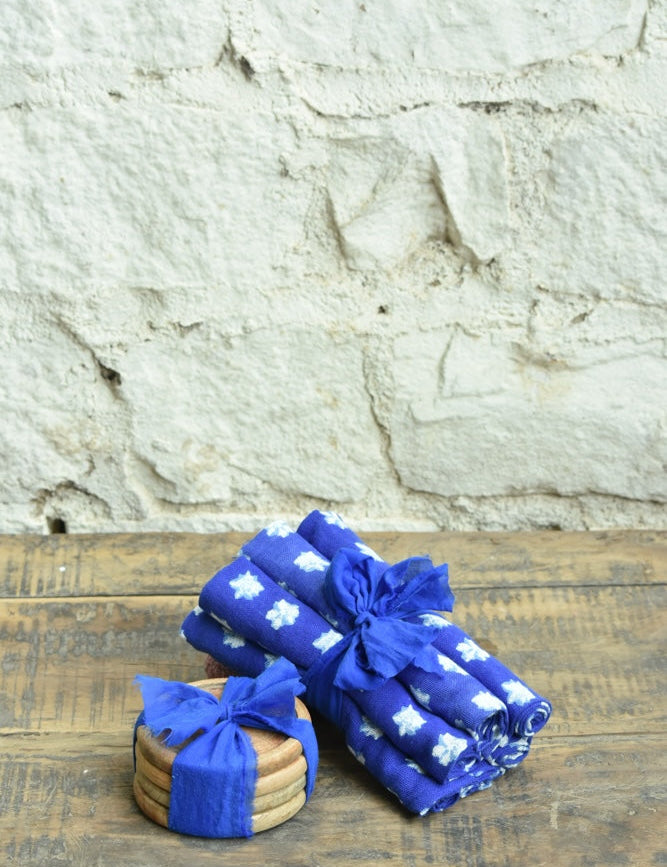Ekaurr Indigo Charm Table Set curated artisan gifting set of hand-beaded or natural stone coasters paired with indigo block-printed fabric napkins, elegant sustainable table accessory gift for home dining and conscious living