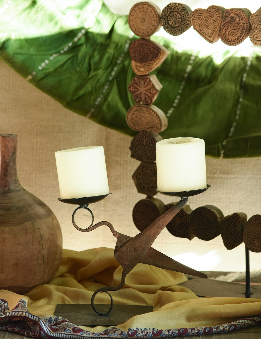 Ekaurr Iron Shear Twin Candle Holder inspired by vintage iron shears, hand-forged with weathered antique finish and symmetrical twin candle cup design