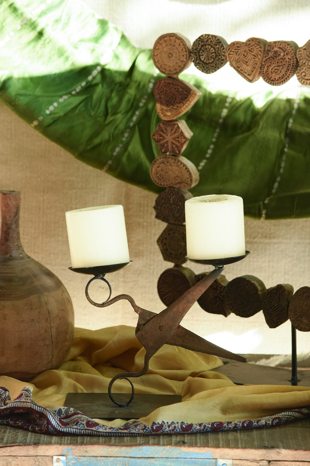 Ekaurr Iron Shear Twin Candle Holder inspired by vintage iron shears, hand-forged with weathered antique finish and symmetrical twin candle cup design